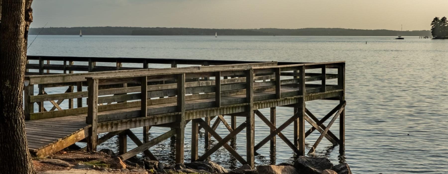 a wooden bridge over water