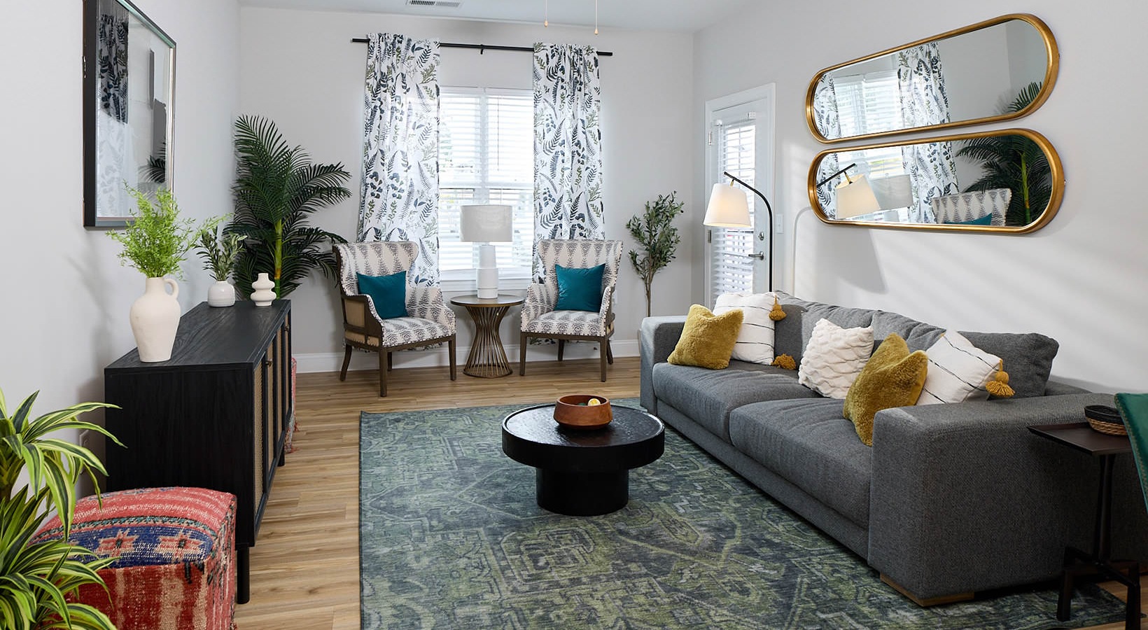 spacious living room with windows