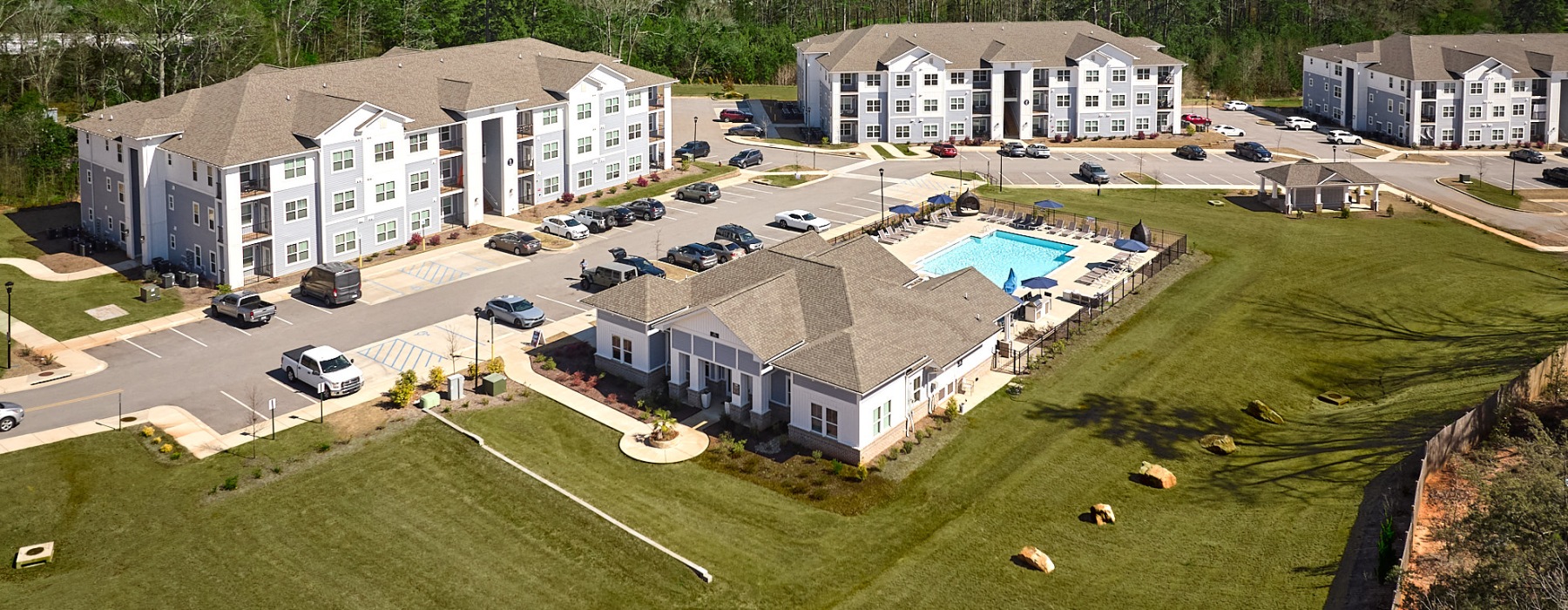 aerial view of buildings and pool